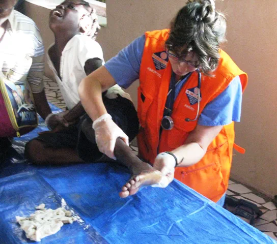 Serving Abroad — AMURT — Didi Cirasmita at a medical camp, Haiti