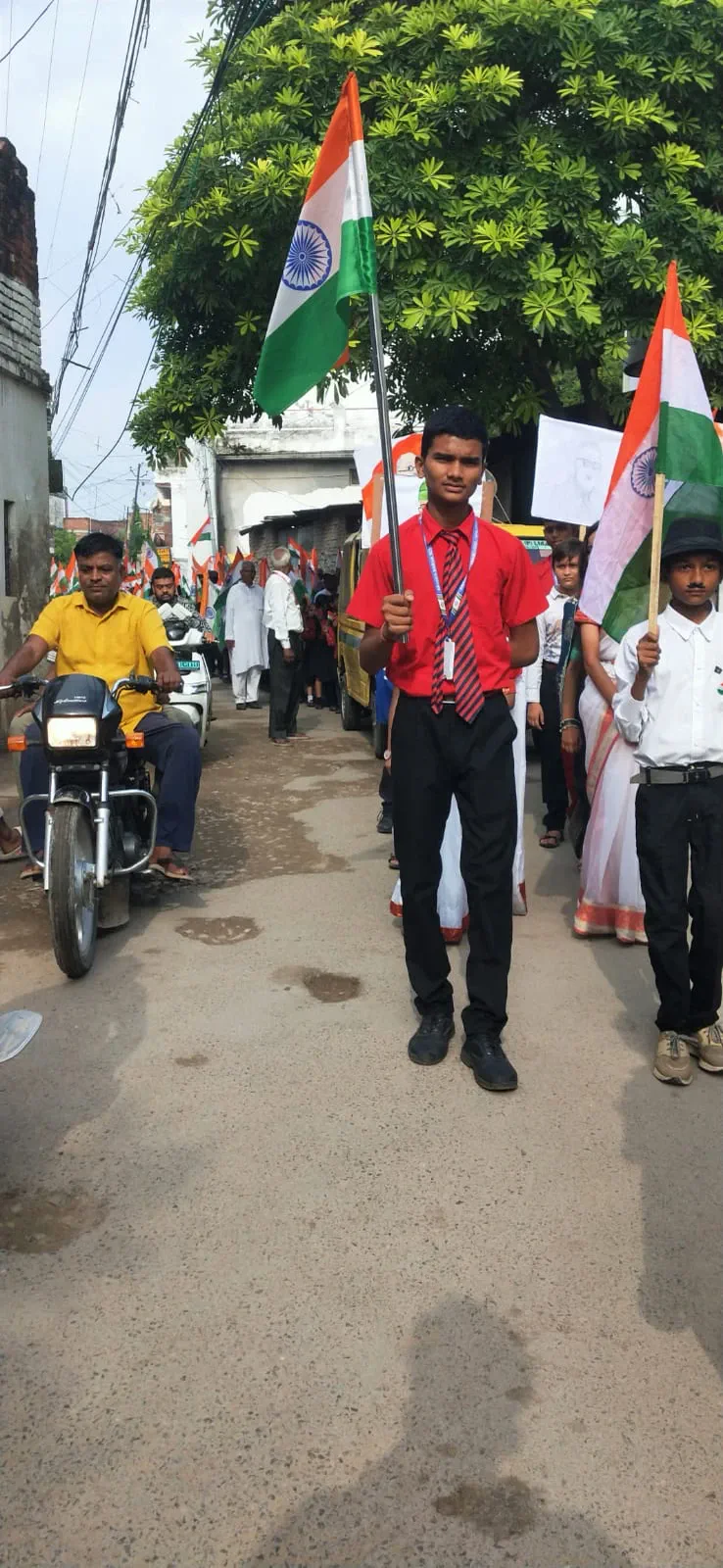 A young volunteer heads the rally